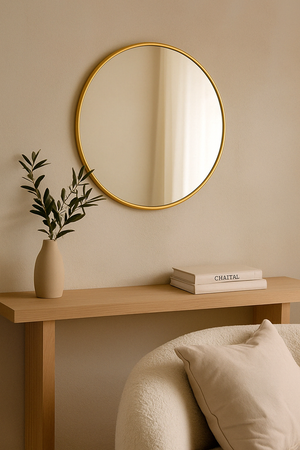 Ronde gouden spiegel 40 cm – Minimalistische elegantie en lichtreflectie

