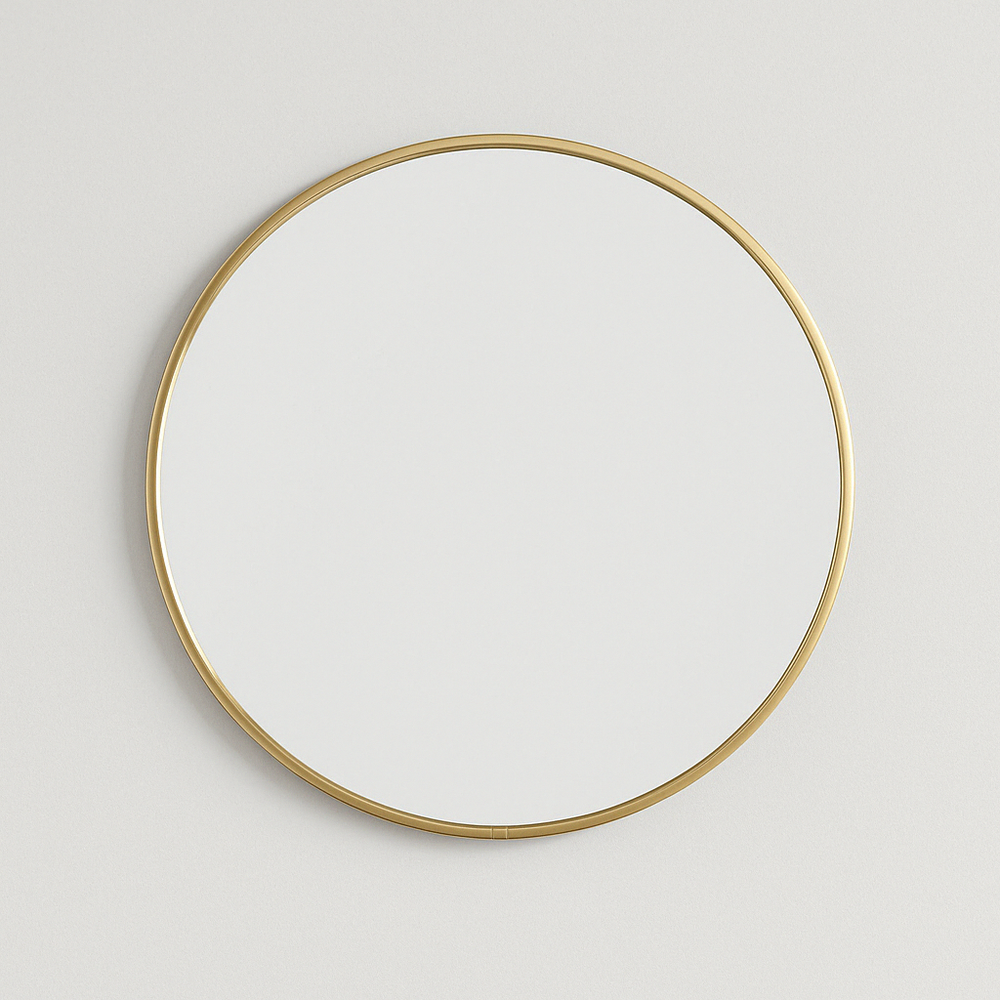 Ronde gouden spiegel 40 cm – Minimalistische elegantie en lichtreflectie
